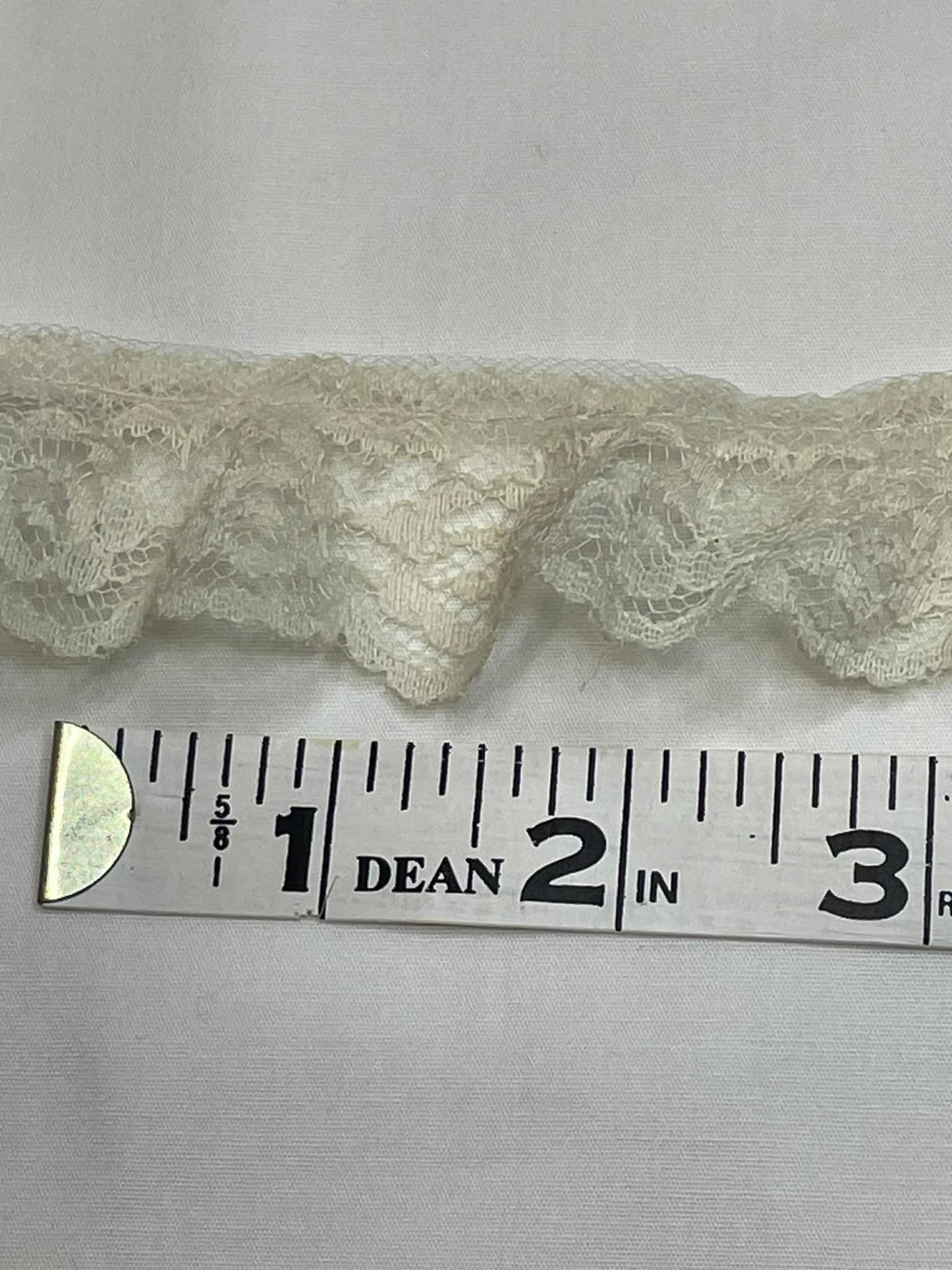 1" Wide Off White Trim.  Sold by the yard.