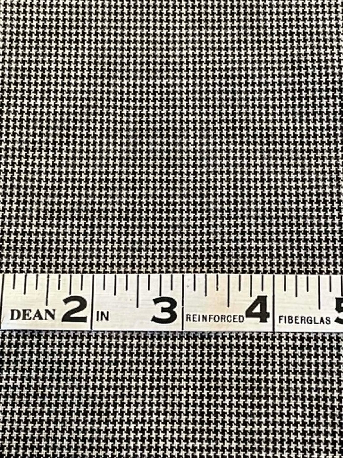 Black and white houndstooth.  Sold by the yard.