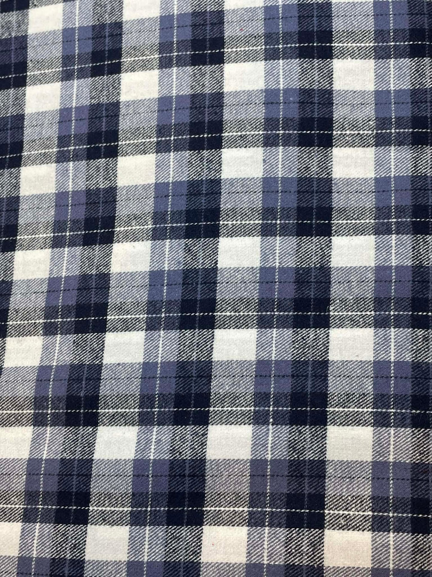 Ozark Mountain flannel.  Yarn dyed blue and white plaid.  Sold by the yard.