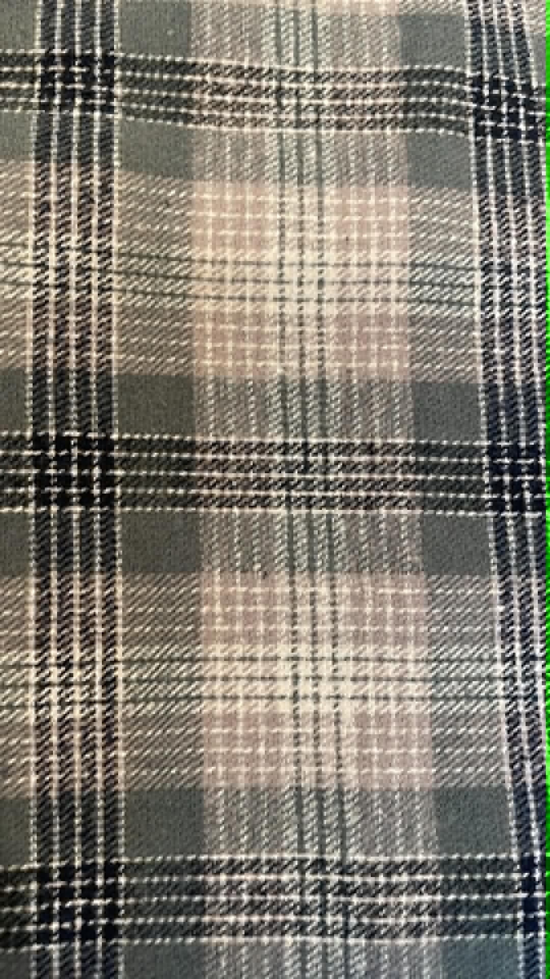 Ozark Mountain flannel.  Green, tan and black plaid.  Sold by the yard.