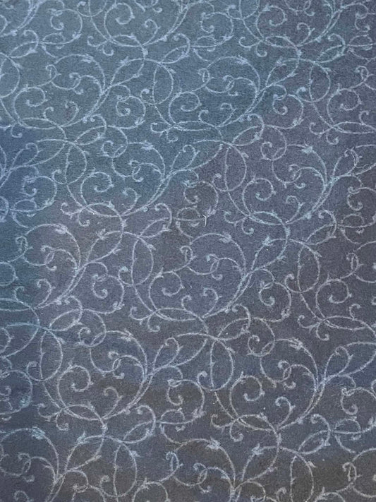 Flannel.  "Carousel" Black with gray swirls.  Sold by the half yard.
