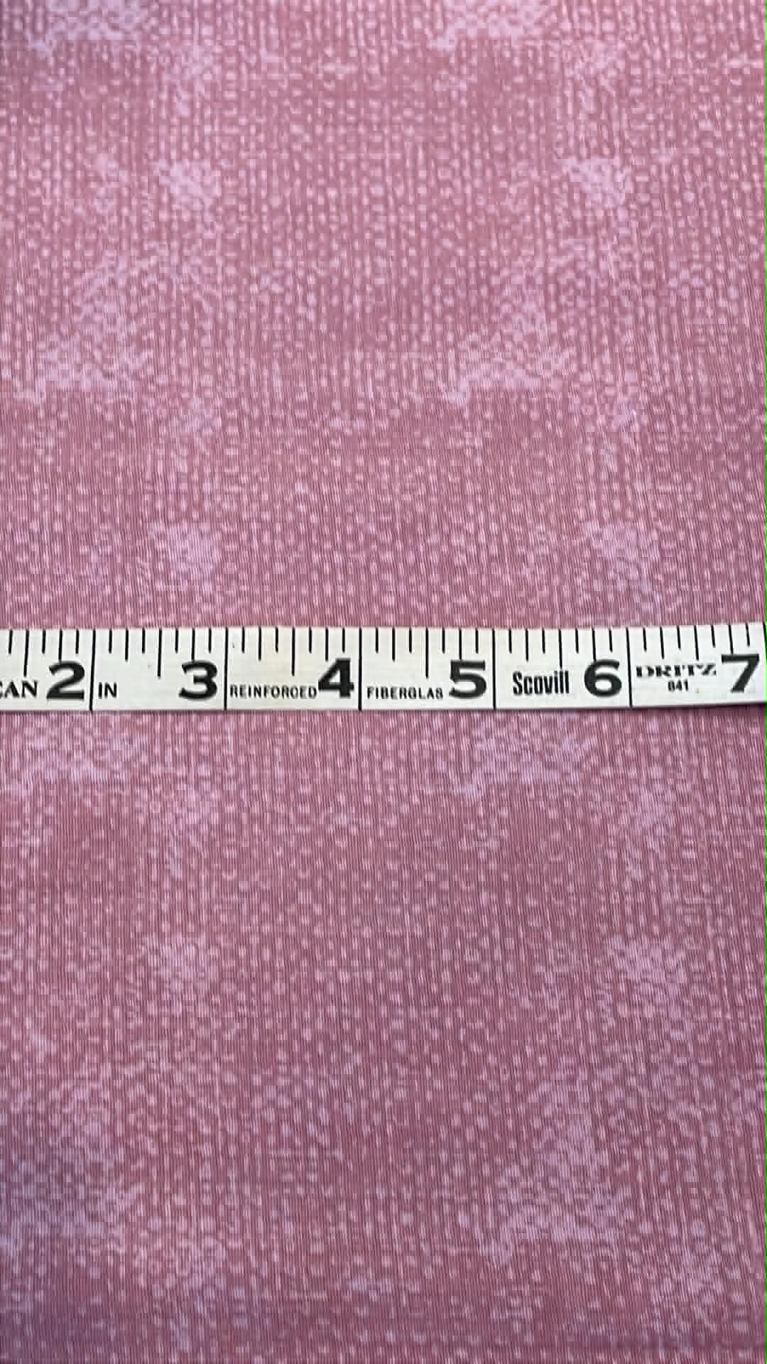 Dusty rose 2 tone weave print.  Sold by the half yard.