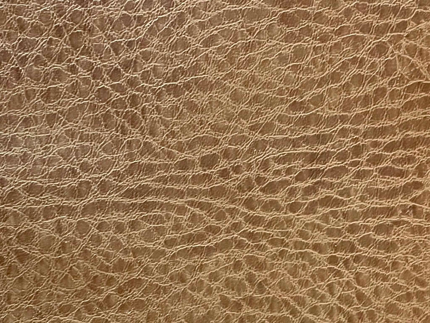 Remnant.  Tan textured faux leather