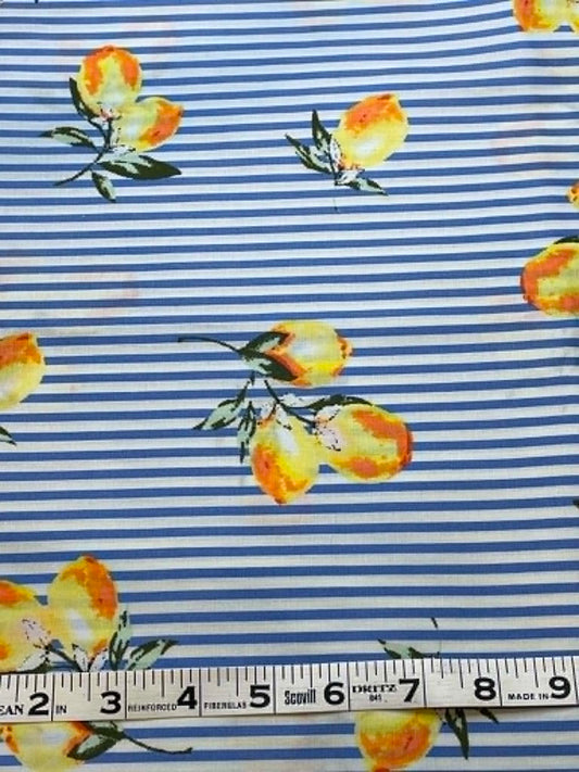 Lemons on blue and white stripes.  Sold by the yard.