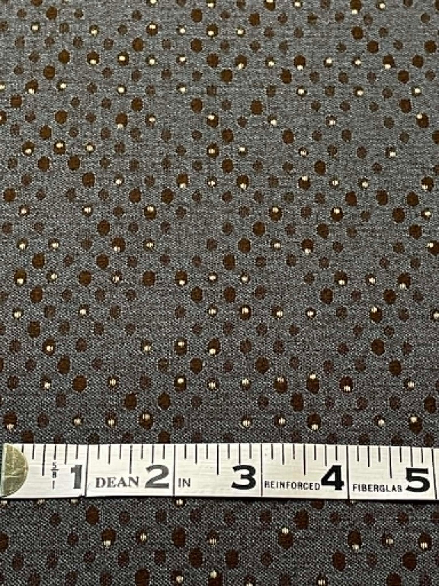 Bluish gray upholstery fabric with dots.  Sold by the yard.