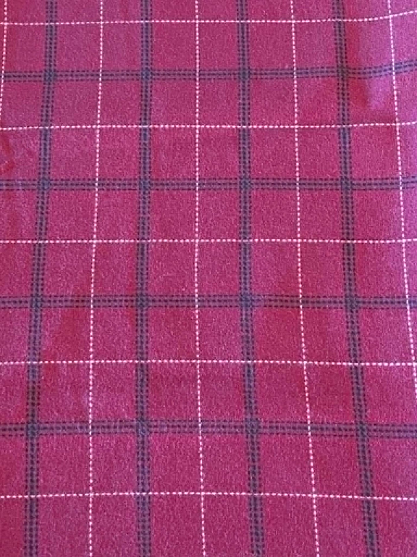 Flannel.  Red with black and white.  Sold by the yard