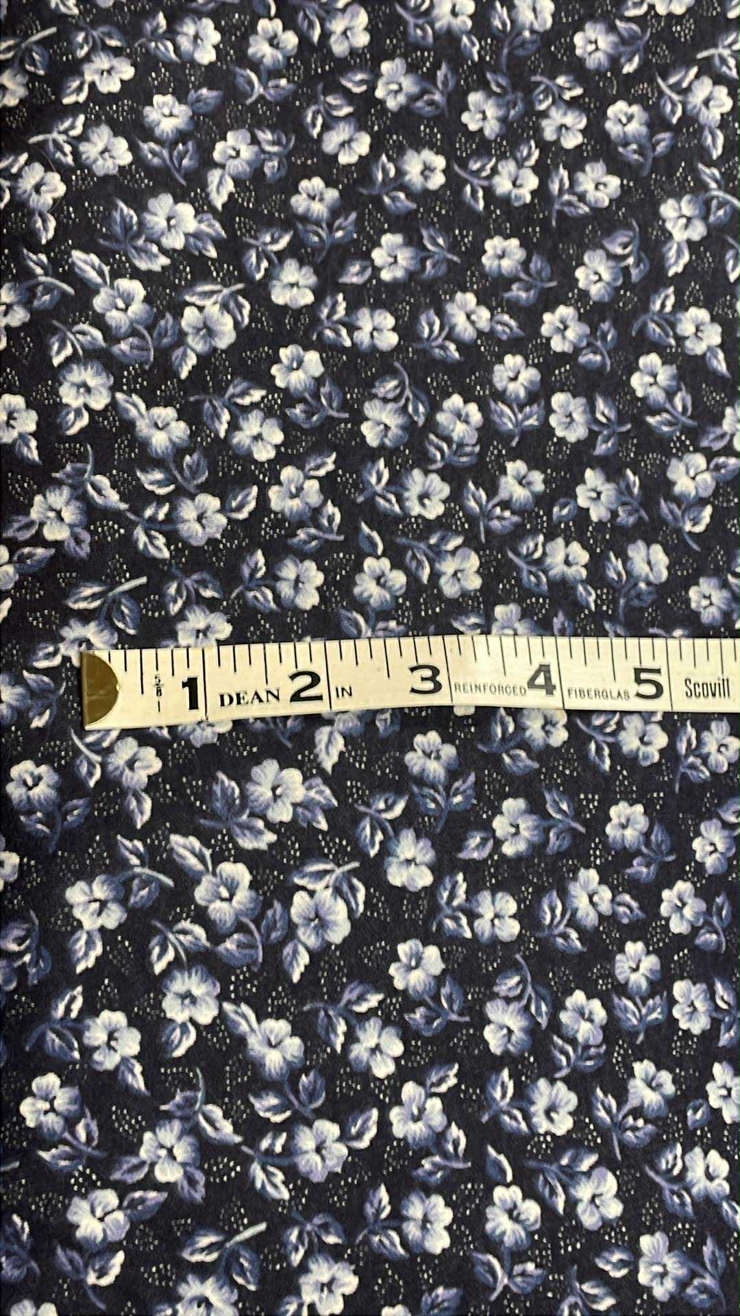 White flowers on navy blue background