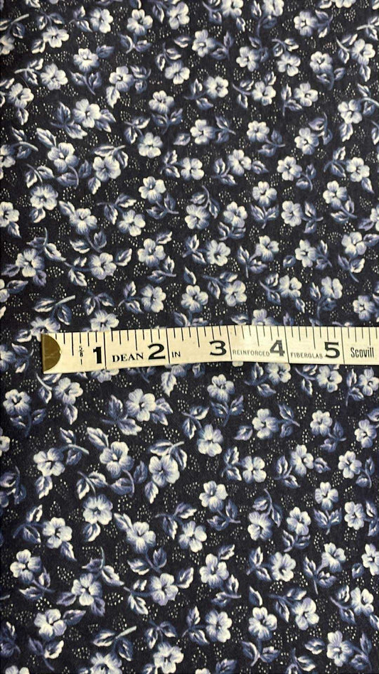 White flowers on navy blue background