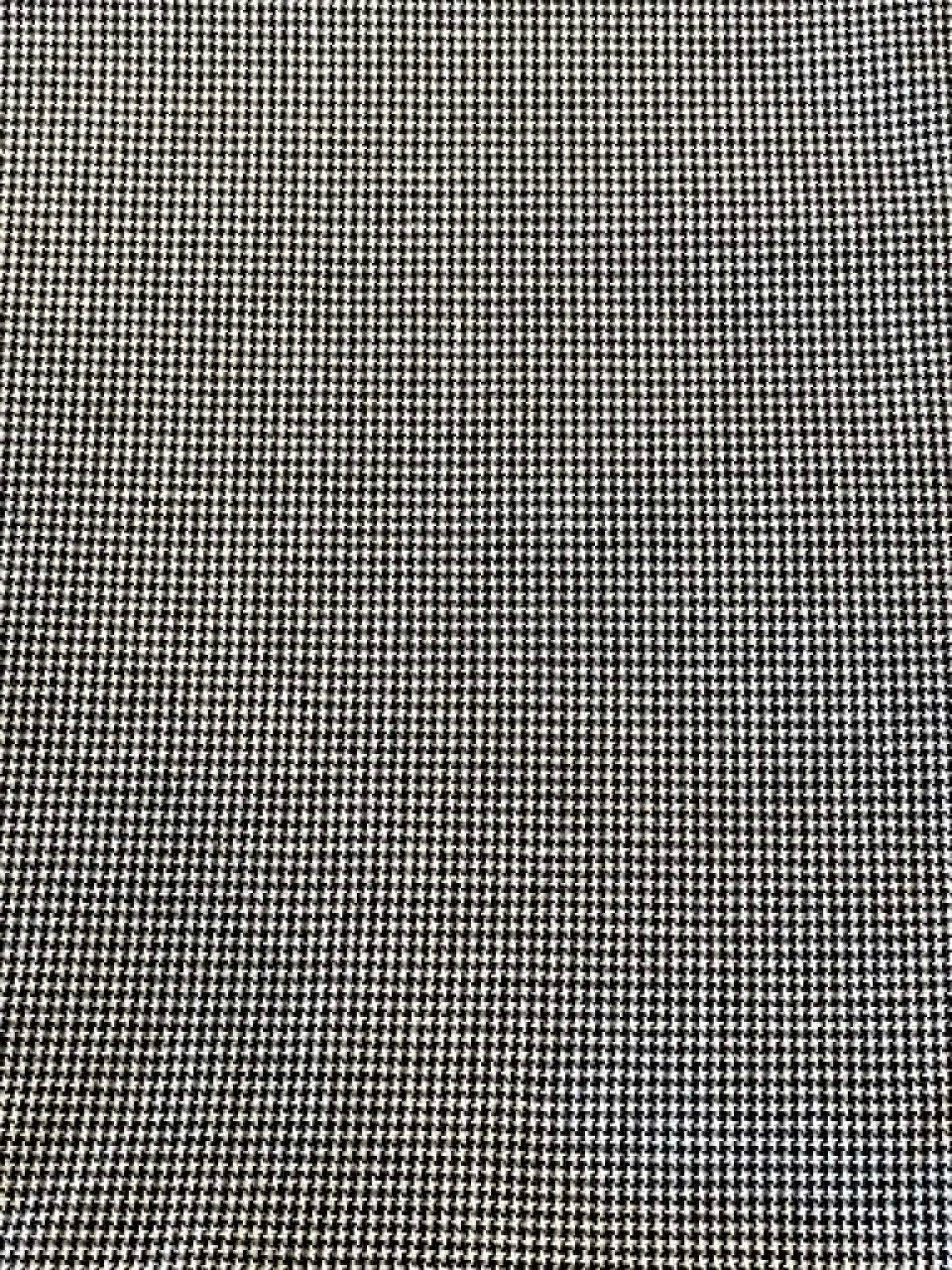 Black and white houndstooth.  Sold by the yard.