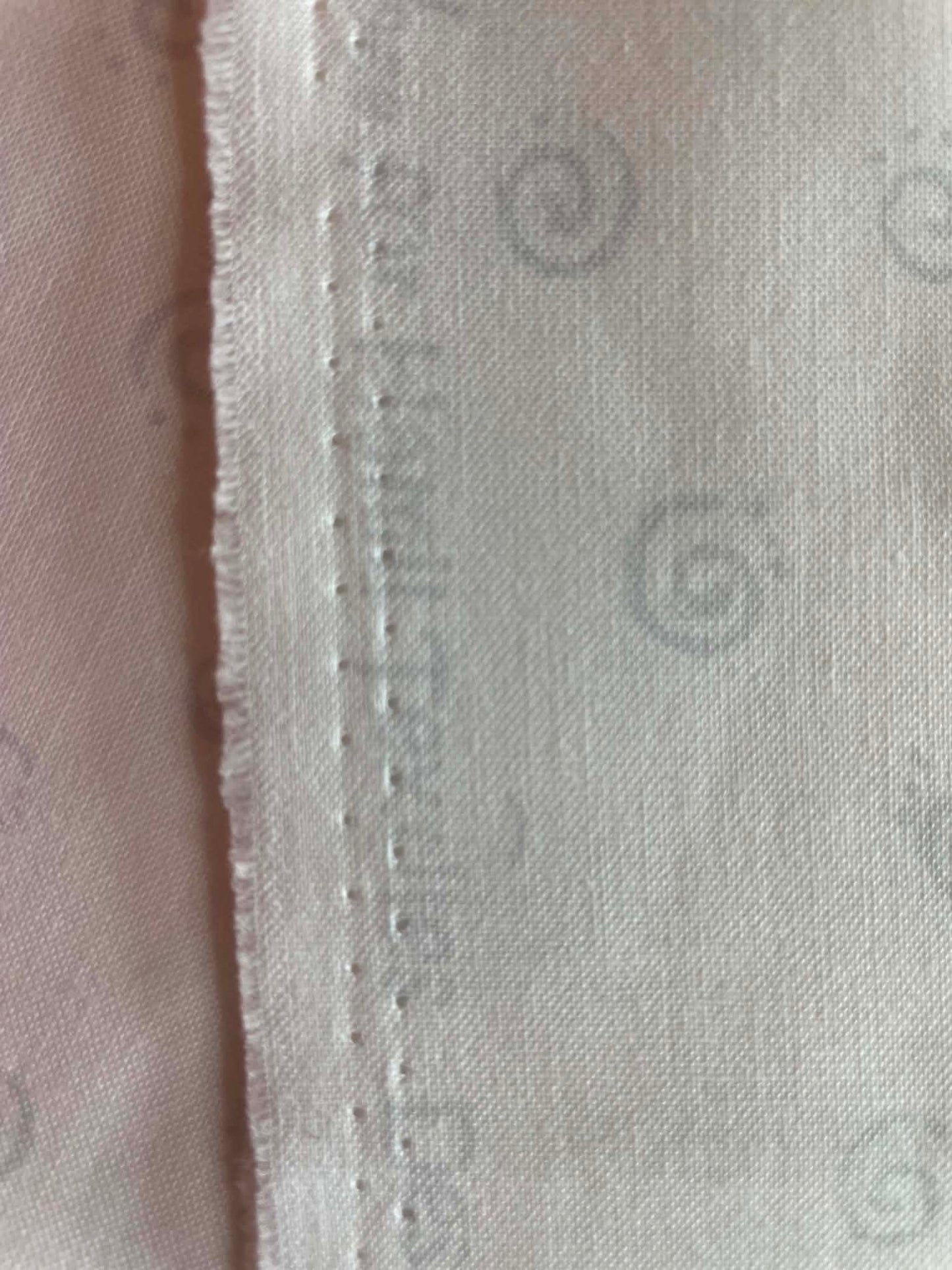 Gray Swirls on white.  Sold by the yard.