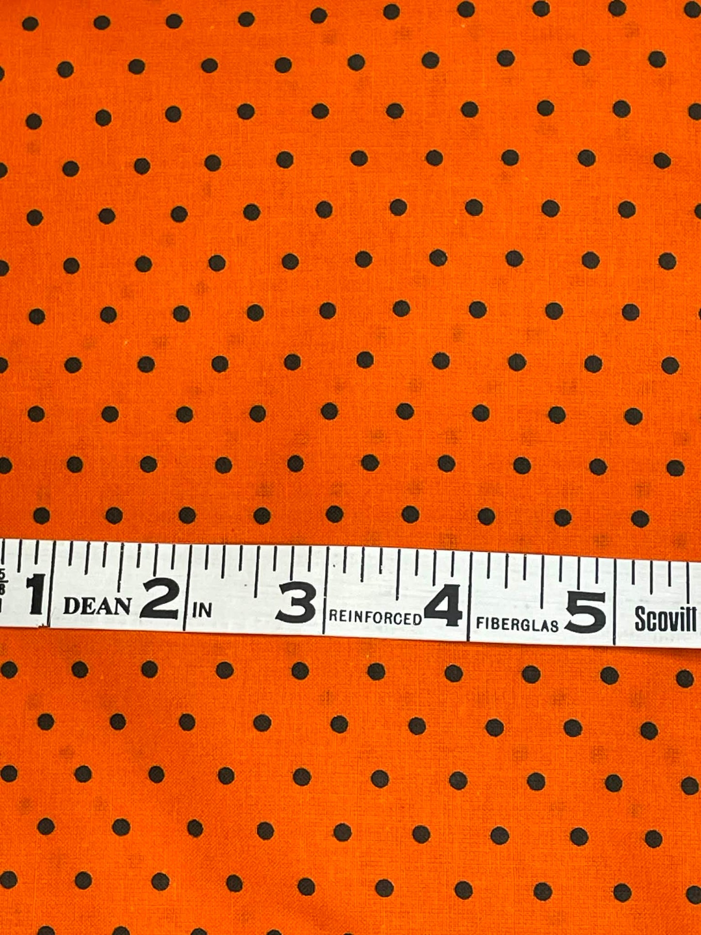 Halloween Dots - black dots on orange background.  Sold by the yard.