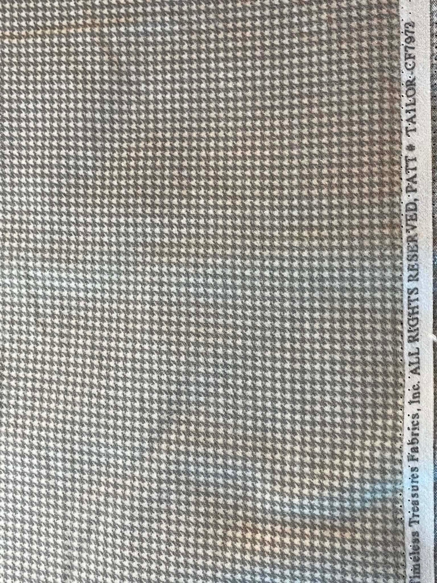Flannel.  Gray houndstooth.  Sold by the half yard.