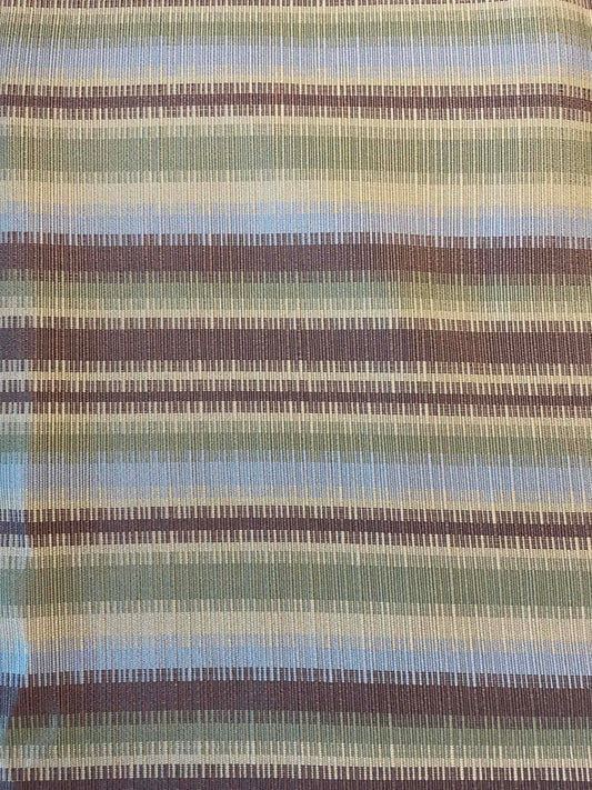 Green, blue and brown stripes.  Heavy upholstery fabric.  Sold by the yard.