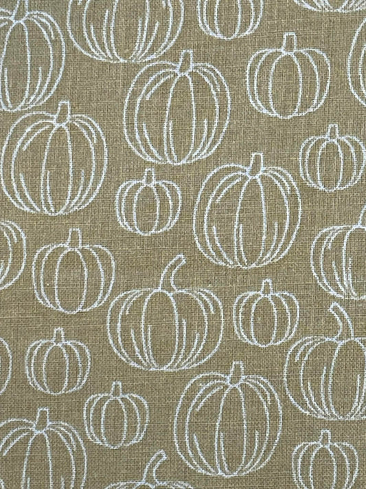 Pumpkins on neutral background.  Sold by the yard.