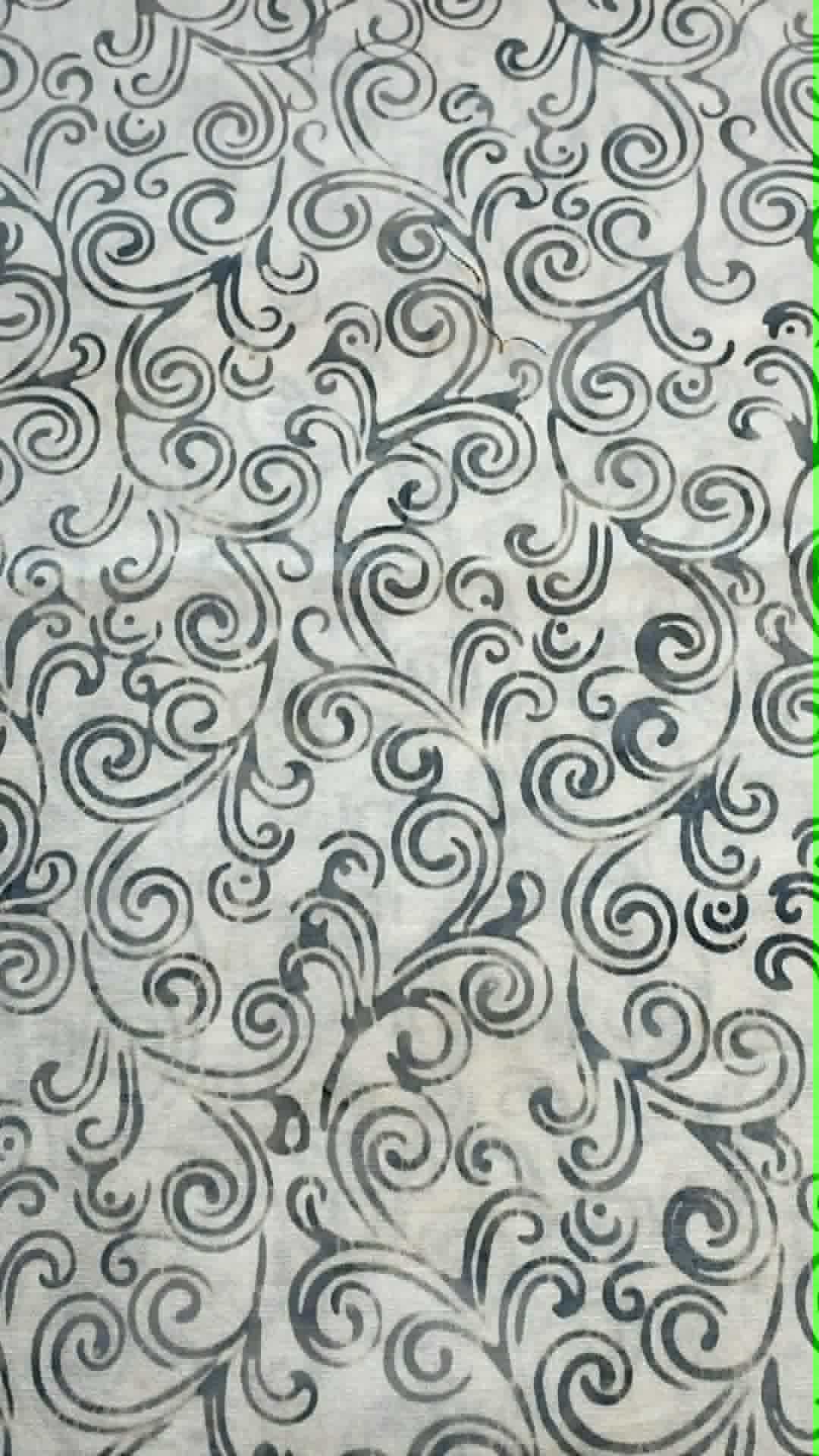 Bluish gray swirls on white background.  Sold by the half yard.