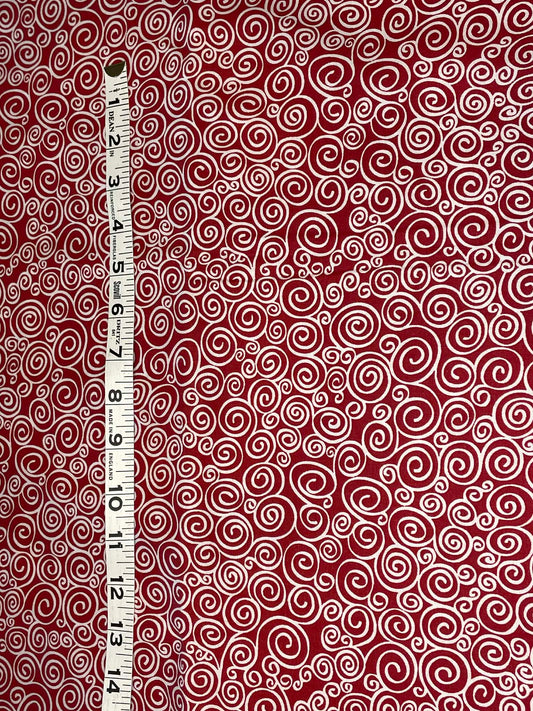 White swirls on red background - Sold by the 1/2 yard.
