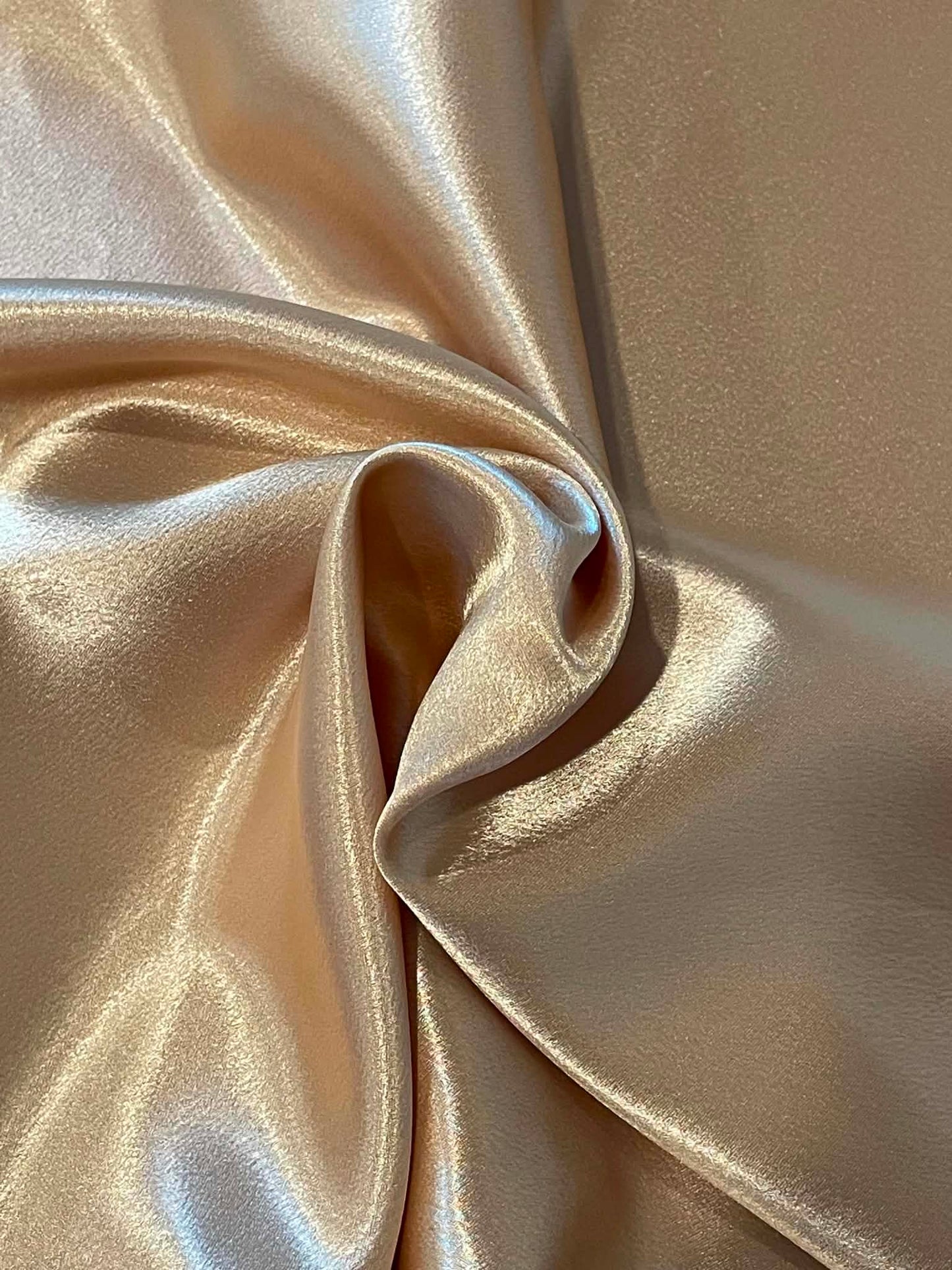 Gold crepe backed satin.  Sold by the yard.