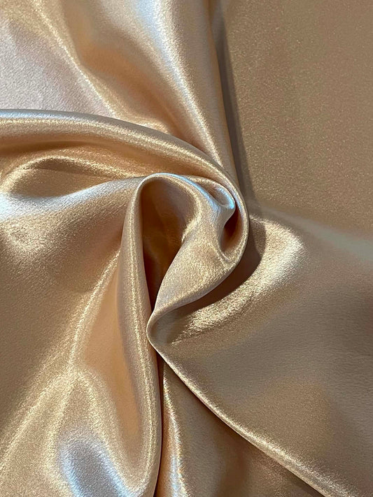 Gold crepe backed satin.  Sold by the yard.