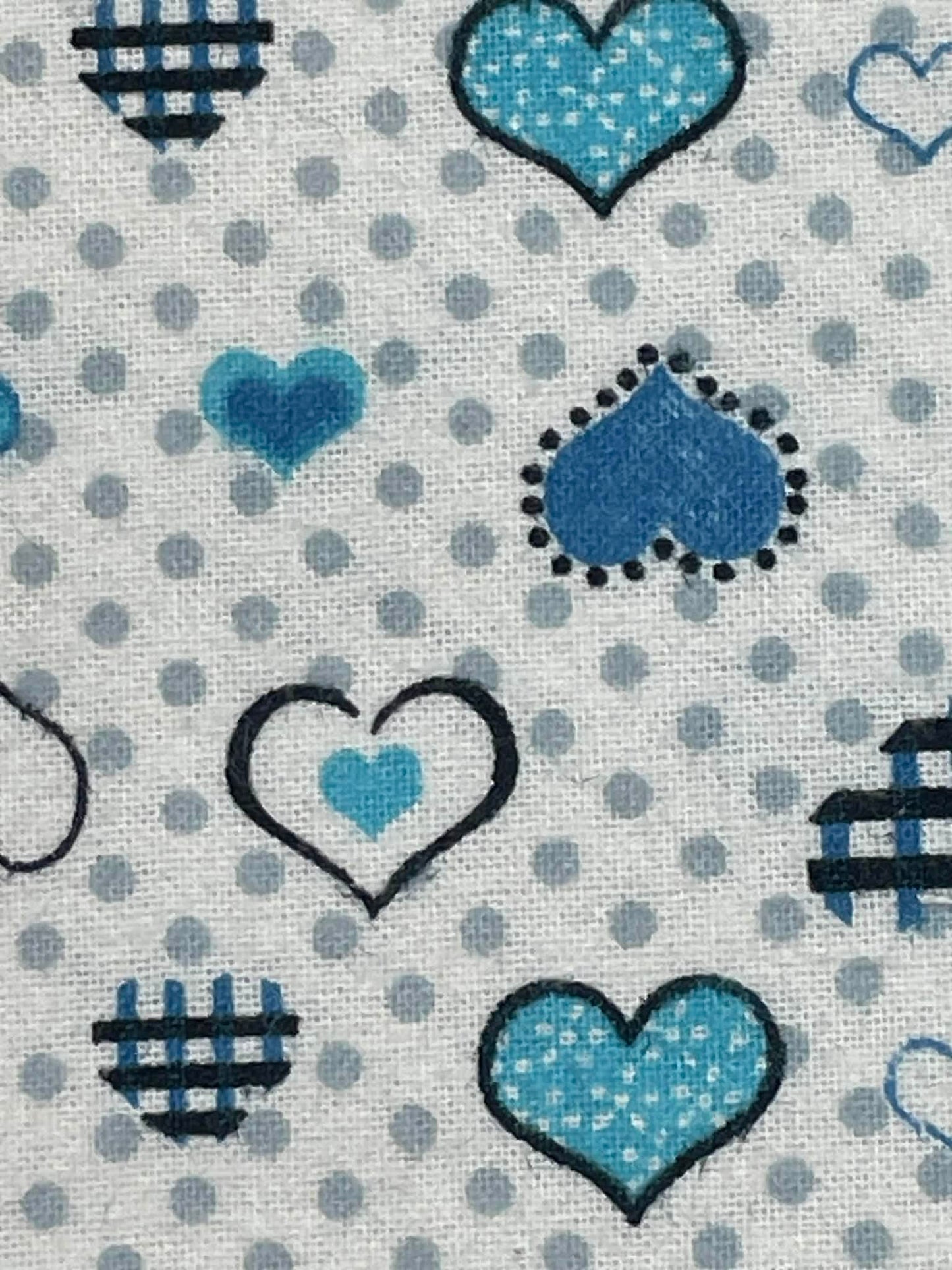 Flannel blue hearts and gray dots.  Sold by the half yard.
