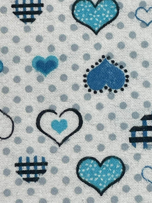 Flannel blue hearts and gray dots.  Sold by the half yard.