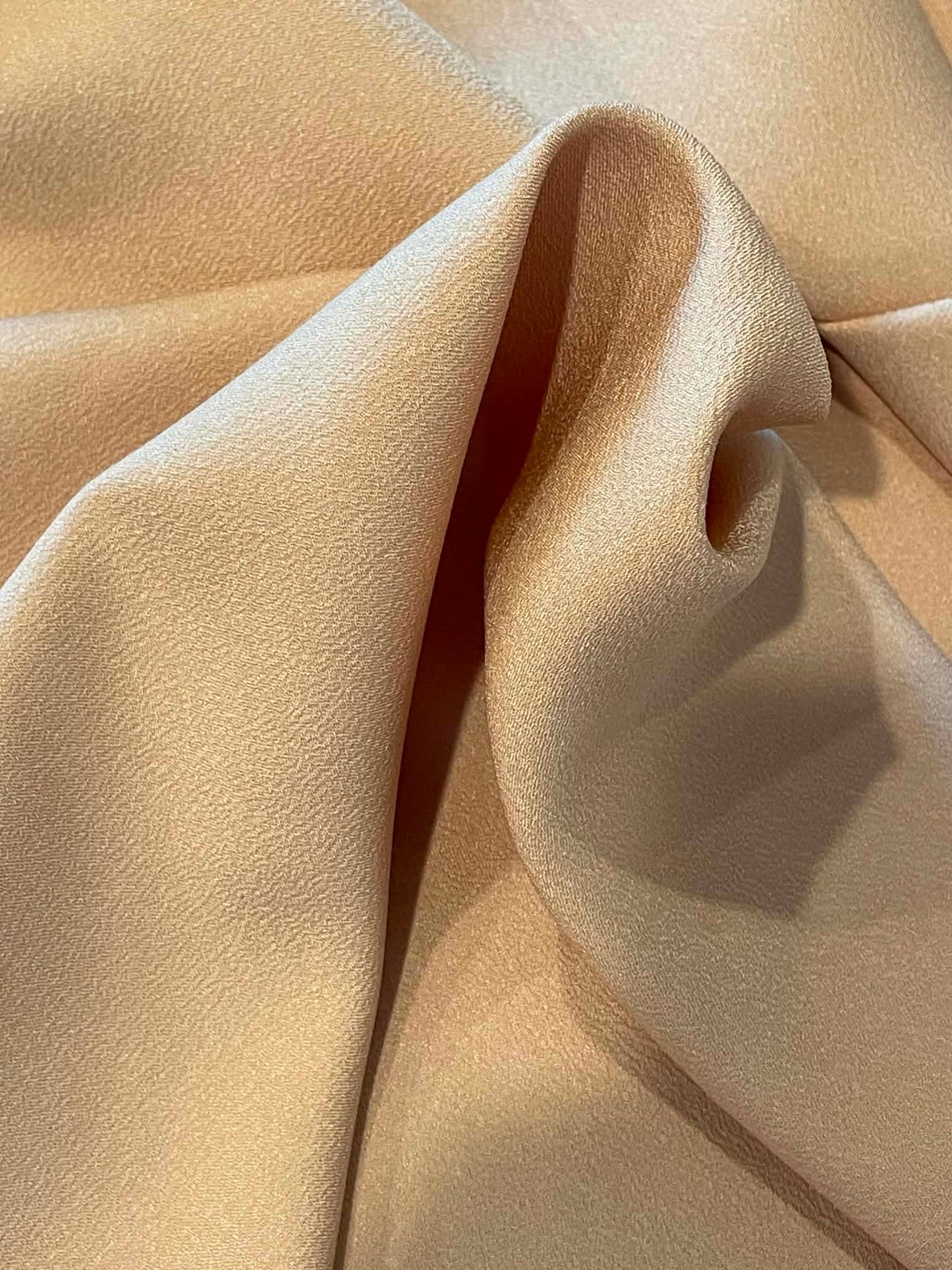 Gold crepe backed satin.  Sold by the yard.