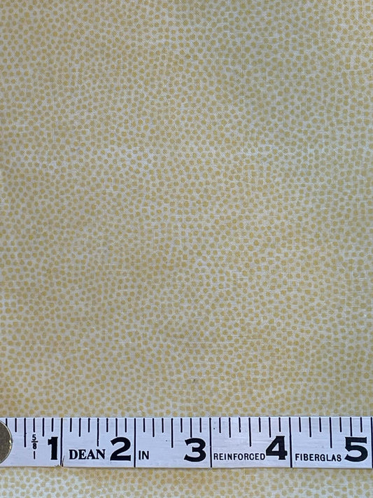 Tiny yellow polka dots on pale yellow background.  Cranston Print Works.  Sold by the yard.