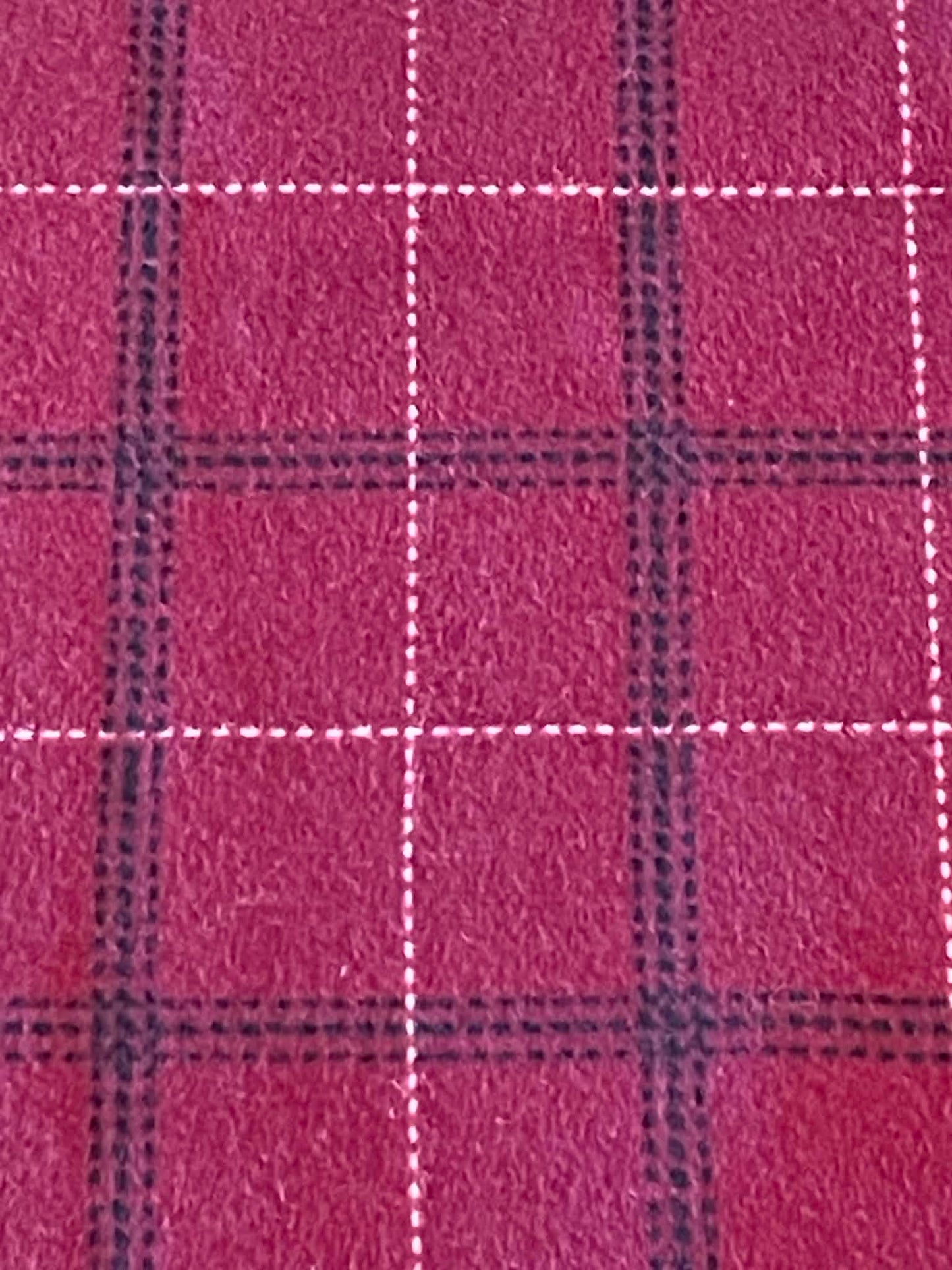 Flannel.  Red with black and white.  Sold by the yard